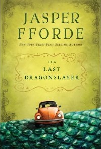 Cover of "The Last Dragonslayer," featuring a small orange car on green ground that looks like scales