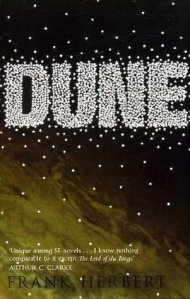 Cover of "Dune," featuring a collection of sparkles forming the title on a brown and tan background that looks like a brown sunset or a dust storm.