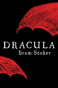 Cover of "Dracula," featuring two red bat wings against a black background.