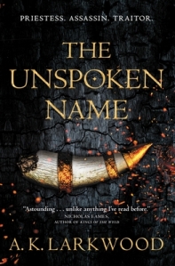 Cover of the book, featuring a broken tusk with gold on the tip against a black, charred background.