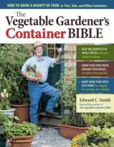 Cover of the book, featuring the author (an older white man) standing in the doorway of a house - he is holding an armful of vegetables, and all around the door of the house are pots full of growing plants.